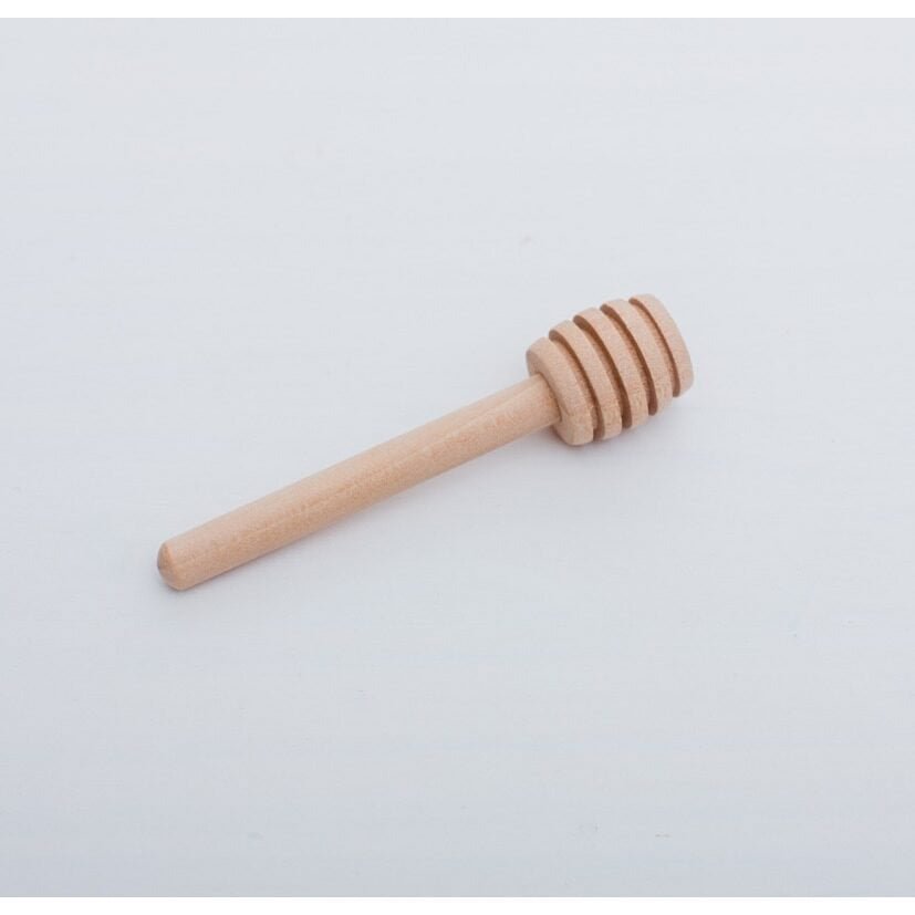 Houten honinglepel voor sensorisch spel in de houten speelbak